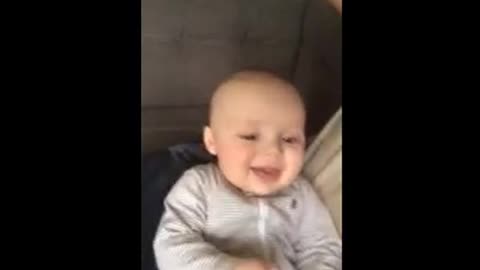 Baby cracks up!