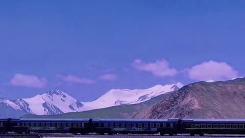 snow mountain and train