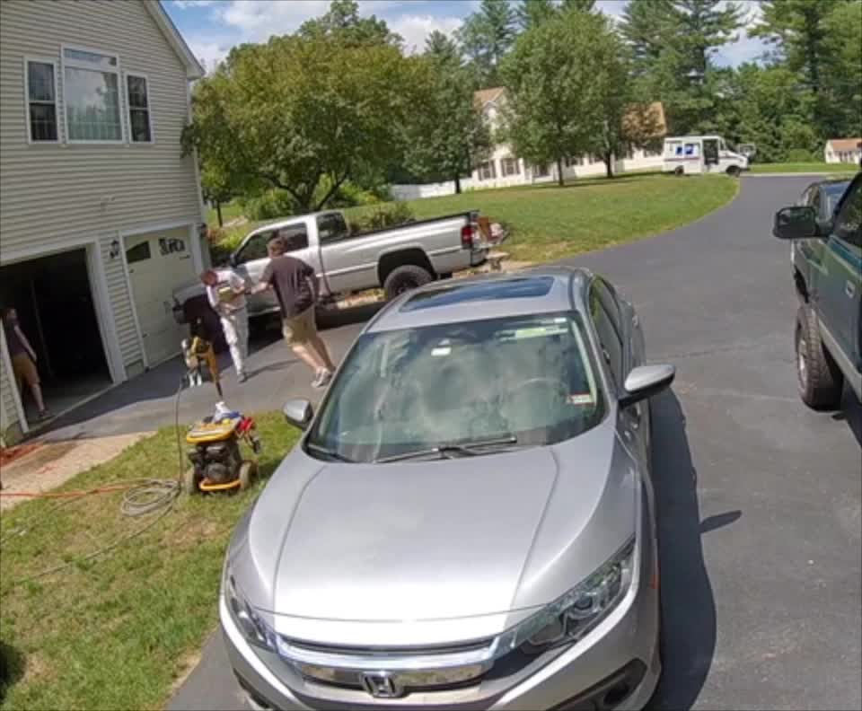 Delivery Driver Hightails It After Happy Dog Says Hello