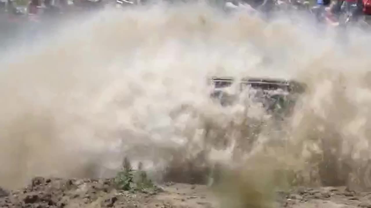 MUD Mega Trucks Jumping at Mud Bog - 4X4 Mud Off-Roading