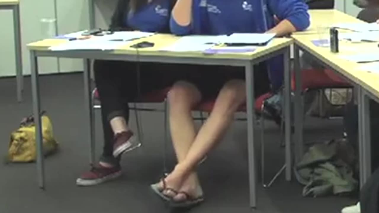 College Student Candid Flip Flops In Classroom