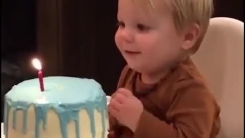 Cute baby boy celebrating his birthday