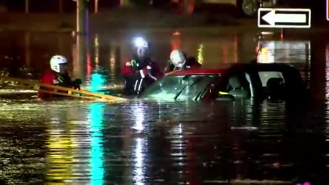 A couple cars underwater after an apparent water main break in Hollywood