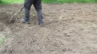 Massive yard redo! Tilling up the yard with a garden machine tiller and releveling it!