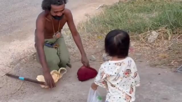 A touching scene on the streets of Thailand