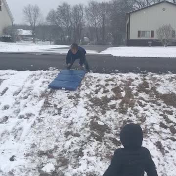 Paul sledding