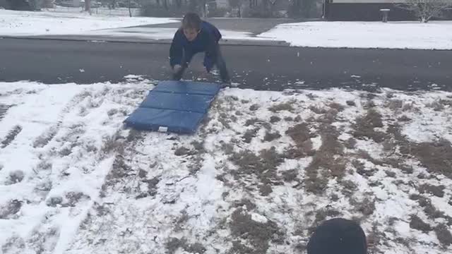 Paul sledding