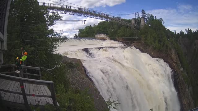 My wife zip-lining across Montmorency Falls.