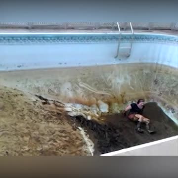 Woman Can't Escape Gross Muddy Swimming Pool