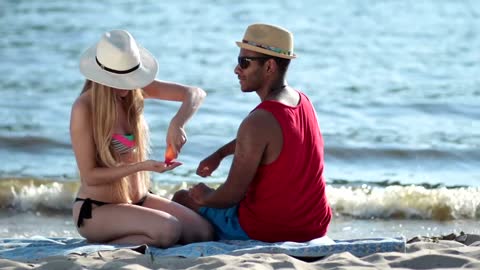 Young couple together at the beach