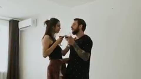 Sexy Couple Drinking And Dancing