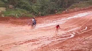 Rain Makes Road into Slippery Slope