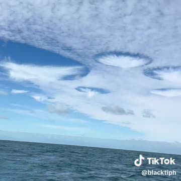 Strange Punch Hole Clouds Filmed In Florida
