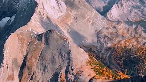 ooking AT the vast mountains AND rivers, looking at the beauty of the world