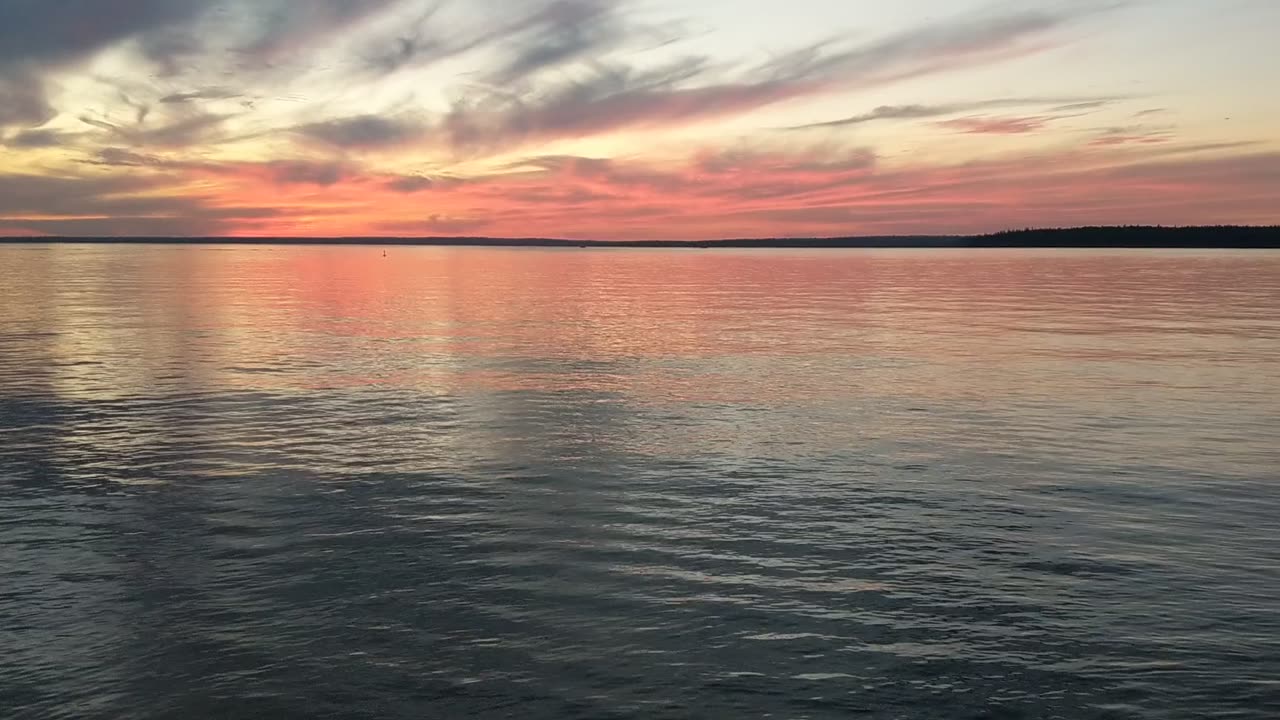 Sunset over calm waters