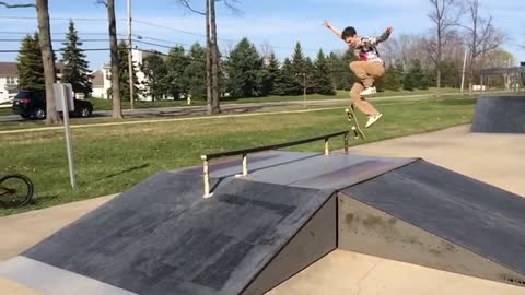 Skateboard misses rail kid hits side