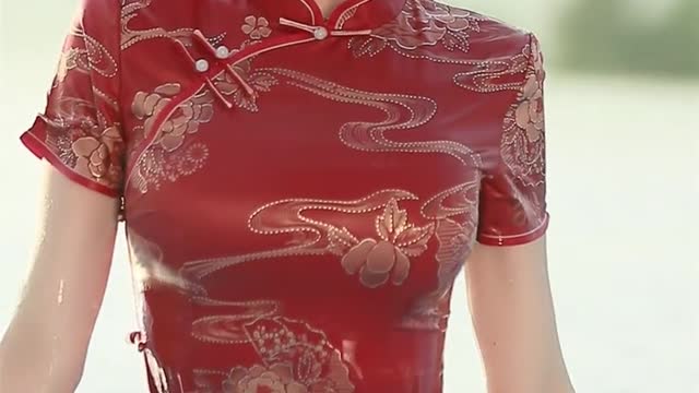 Oriental sexy beauty in cheongsam in the swimming pool