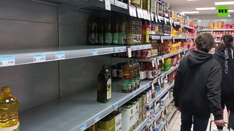 Athens residents line up at supermarkets for groceries