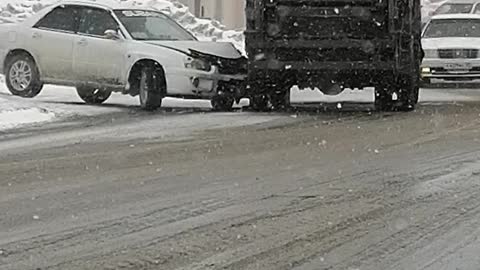 Passenger and garbage truck did not share the road