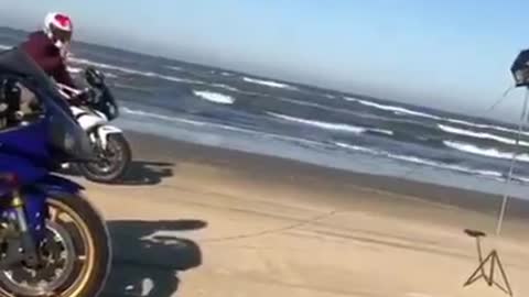 Race on the beach by motorbike, they're doing it wrong.