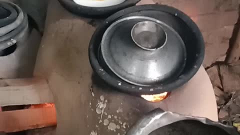 Cooking egg pitha