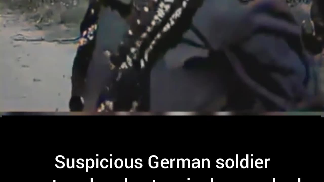 Suspicious German soldier captured searched might be someone famous #Colourized 🔍