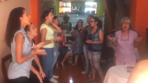 Worship in a Cuban house church.