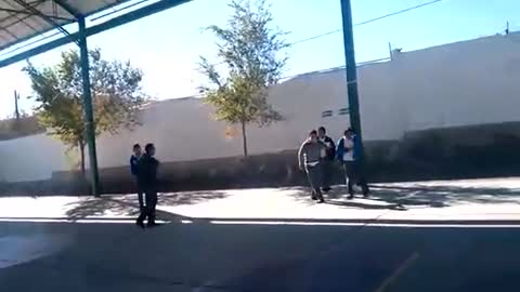 School kids tire throw head duck