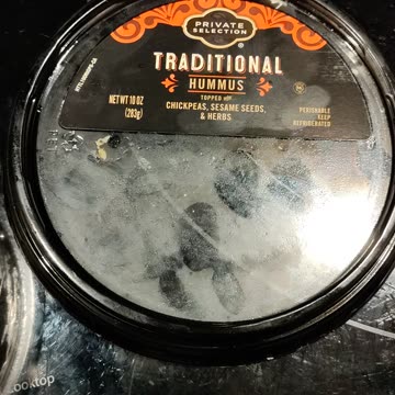 Eating Private Selection Traditional Hummus And Stacy's Pita Thins, 9/25/23