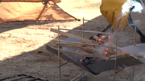 Burning firewood in primitive ways.