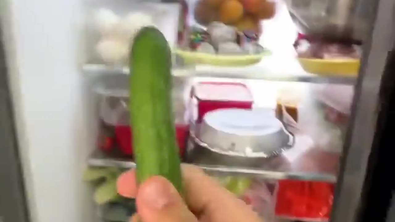 Doing Kuchi Kuchi with a cucumber