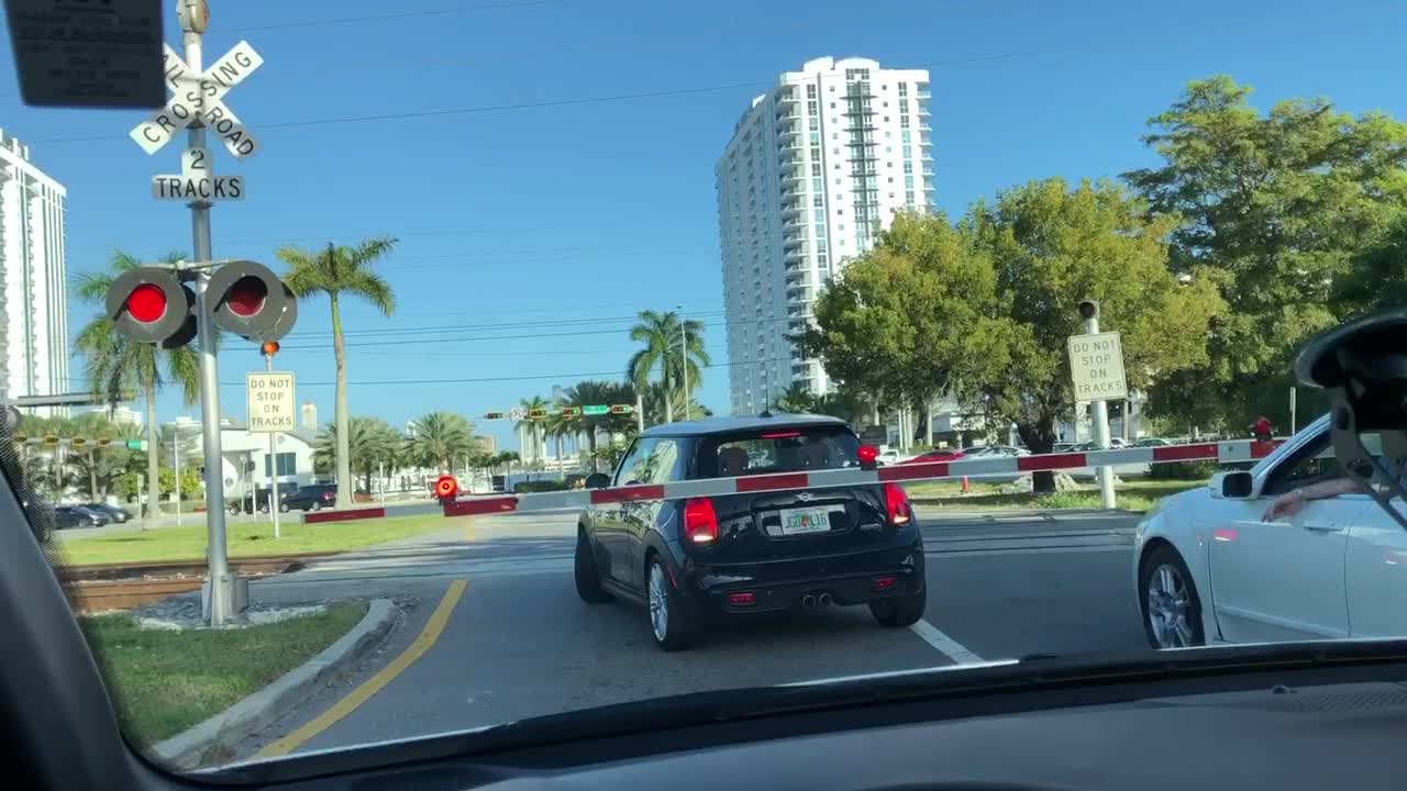 Express Train Slams Car at Crossing