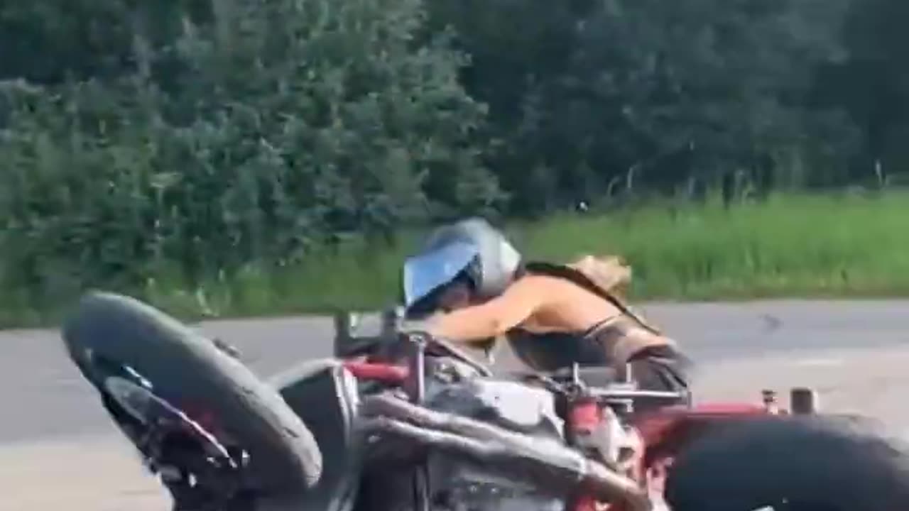 bad moment of a girl on a motorcycle