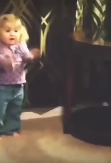 Cute baby dancing in home