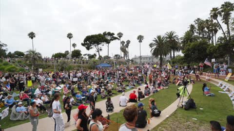 This video is about S.O.S CALIFORNIA NO VACCINE PASSPORT RALLY Santa Monica