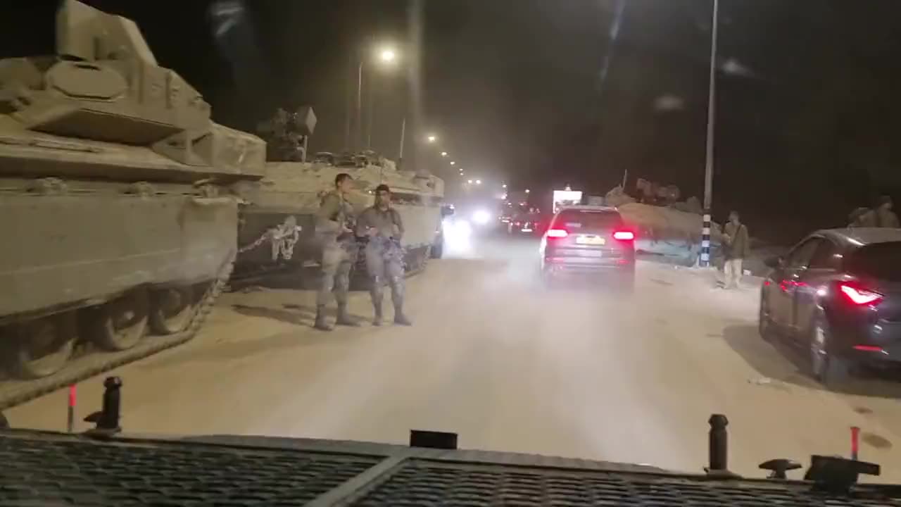 Israeli armor is massing along Route 232, just off the Gaza border.