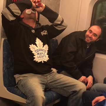 Toronto maple leaf jersey man chugs ketchup on subway