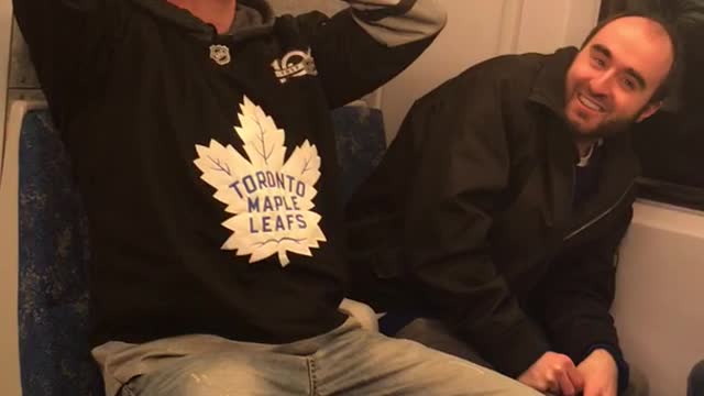 Toronto maple leaf jersey man chugs ketchup on subway