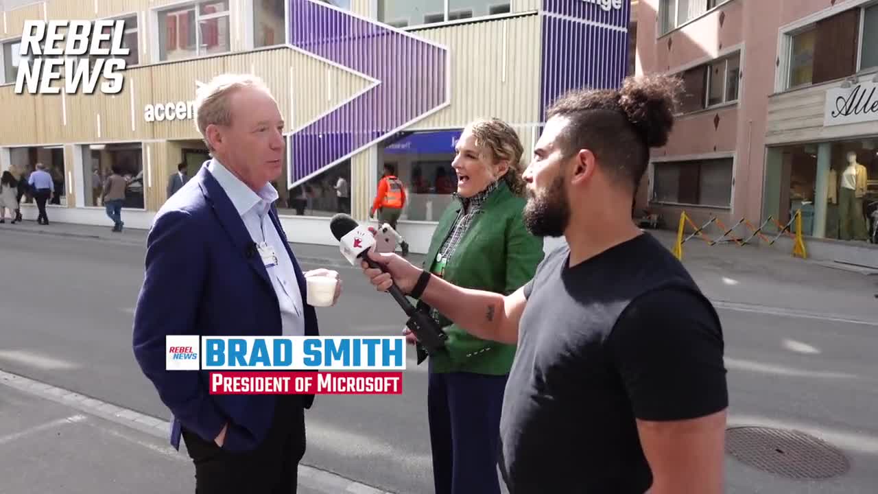 Bumped into Microsoft's PRESIDENT on the streets of Davos wearing UN PIN