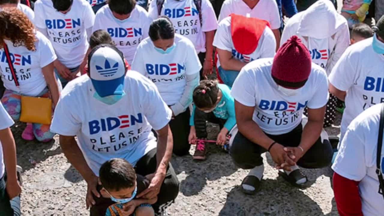 Migrants Crossing U.S. Border Wearing “Biden Please Let Us In!” T-Shirts