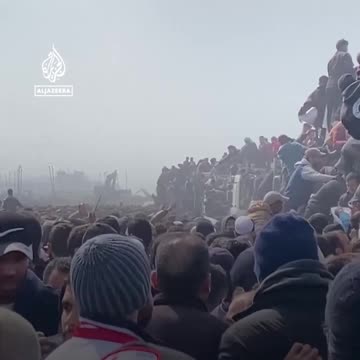 Children collect spilled flour from the ground after Gaza aid chaos | Al Jazeera