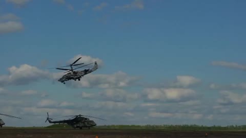 Ka-52 helicopters strike with guided and unguided missiles