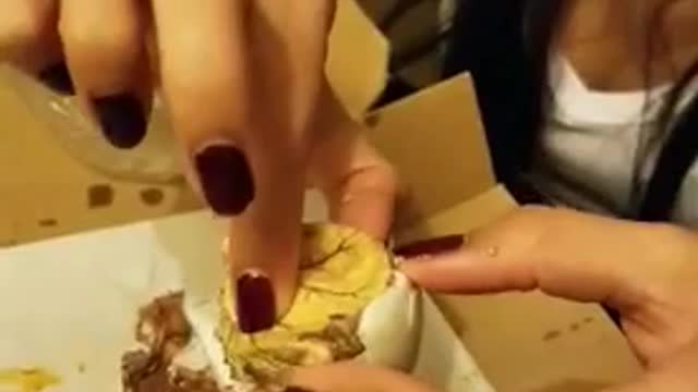 Wife eating exotic food.see what falls out