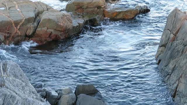 Waves Crashing on Rocks