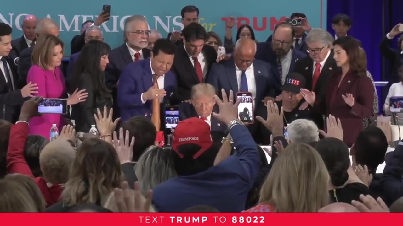 Latino voters and industry leaders pray over President Trump after their town hall