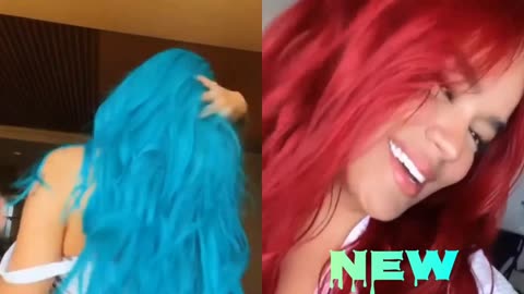 Karol G debuts red hair in new Instagram post. ❤️