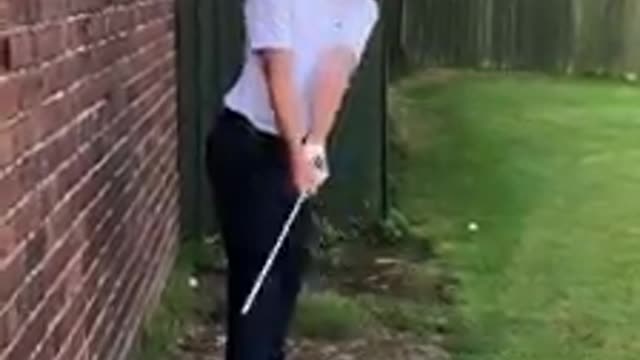 Golf drill use wall to fix slice