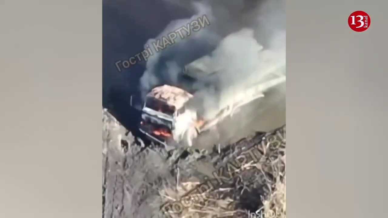 A Russian truck carrying a pontoon sunk in the mud caught fire after a drone strike