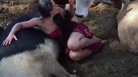 Rescued Animals Melt Into This Woman's Arms When She Sings To Them