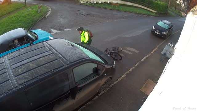 Cyclist Slips on Ice and Slams Car